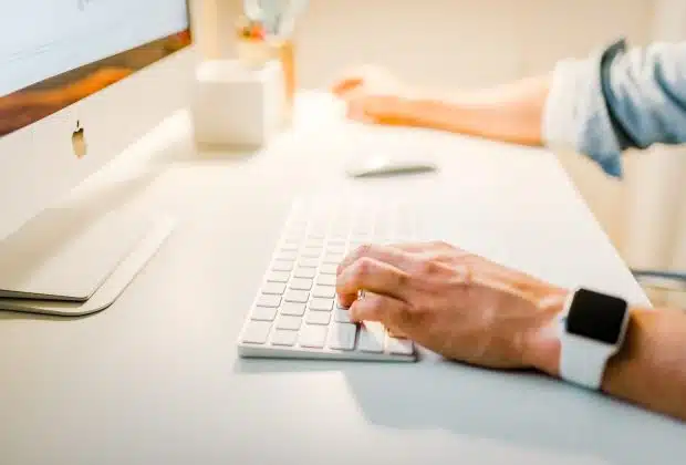 person using iMac